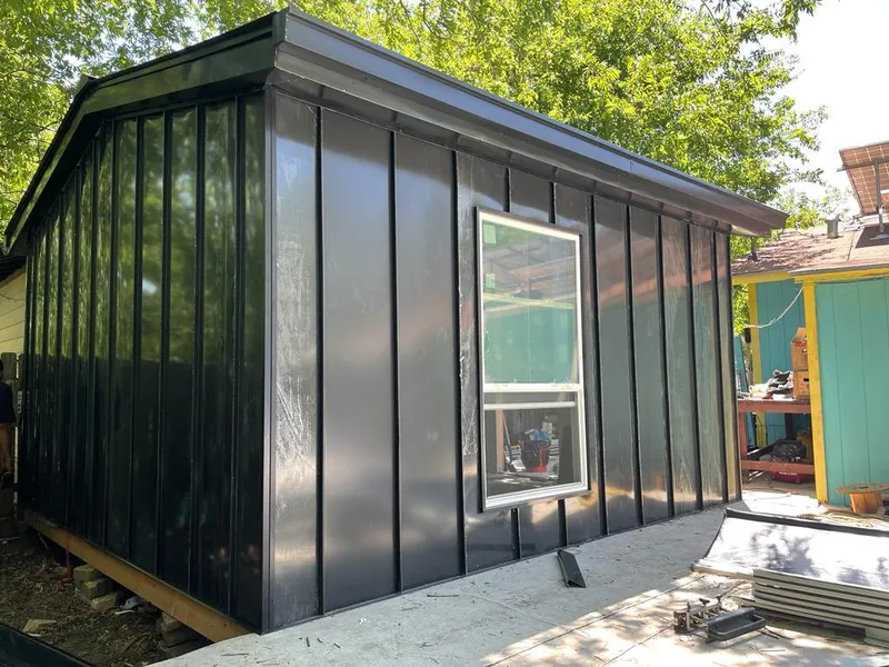 Black standing seam metal wall panels for Metal Roof Installation in Rainbow City